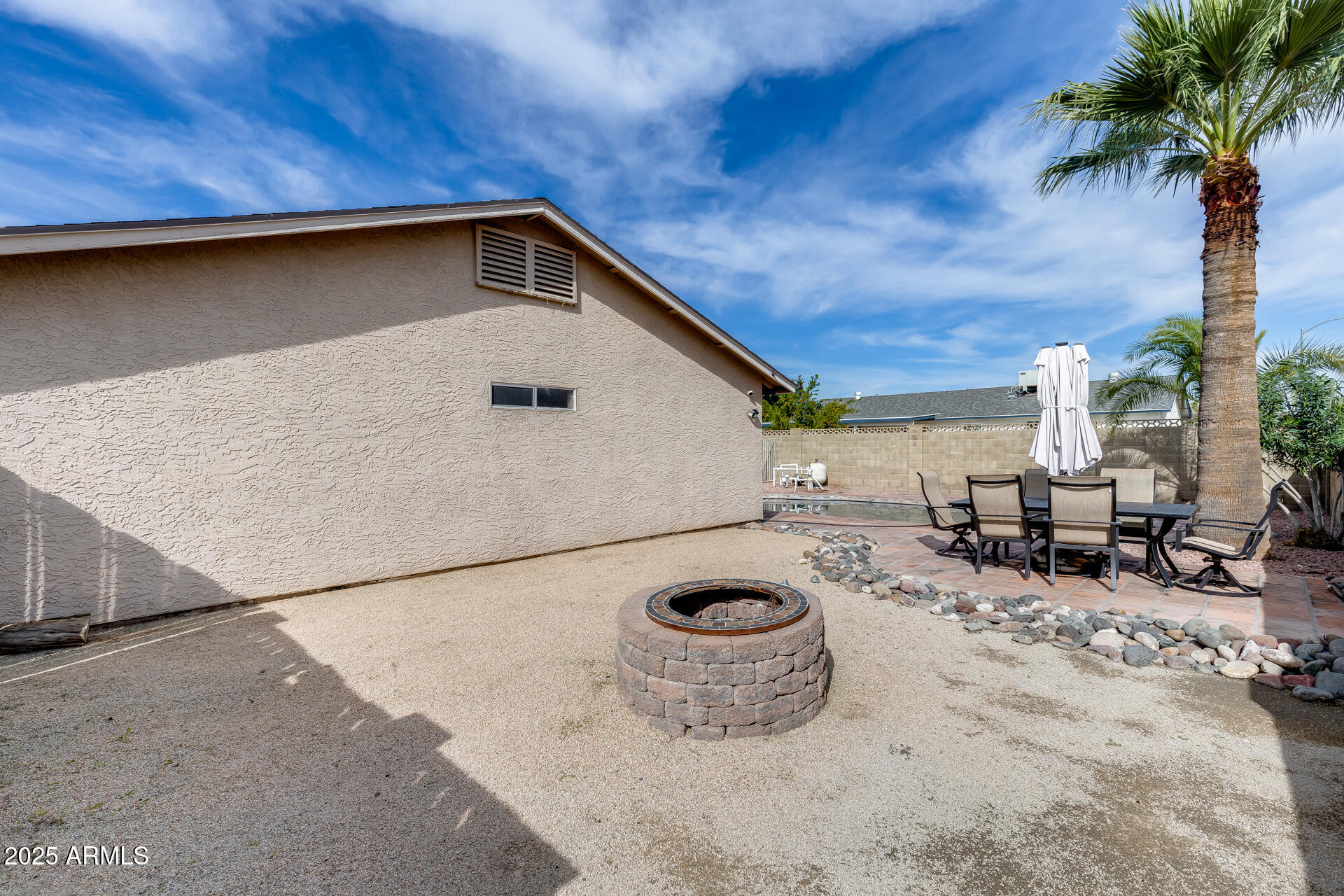 2102 West Marco Polo Road Phoenix, AZ 85027 - Photo 25 of 31 Firepit for cool AZ nights