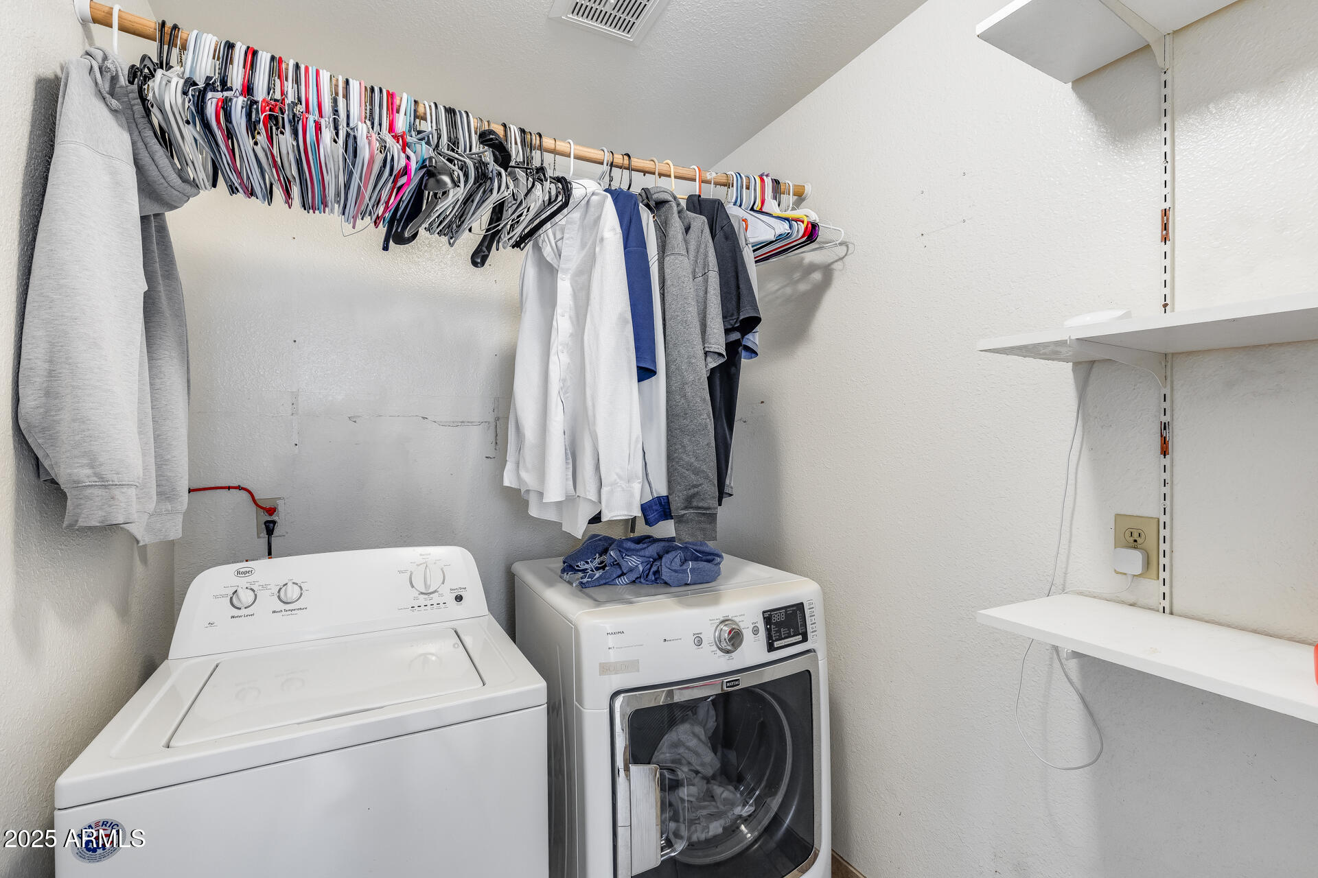 2102 West Marco Polo Road Phoenix, AZ 85027 - Photo 27 of 31 Laundry with storage area
