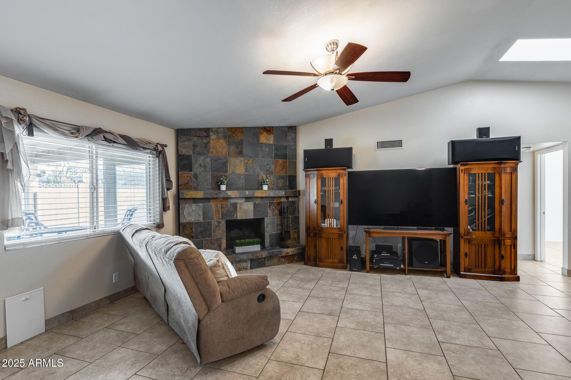 2102 West Marco Polo Road Phoenix, AZ 85027 - Photo 9 of 31 Vauted ceilings and cozy fireplace