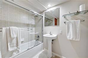 3009 Speedway, Unit 3 Austin, TX 78705 - Photo 15 of 21 a bathroom with a sink a mirror toilet and bathtub