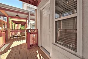 3009 Speedway, Unit 3 Austin, TX 78705 - Photo 19 of 21 a view of a balcony with wooden floor