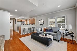 3009 Speedway, Unit 3 Austin, TX 78705 - Photo 2 of 21 a living room with fireplace furniture and a large window