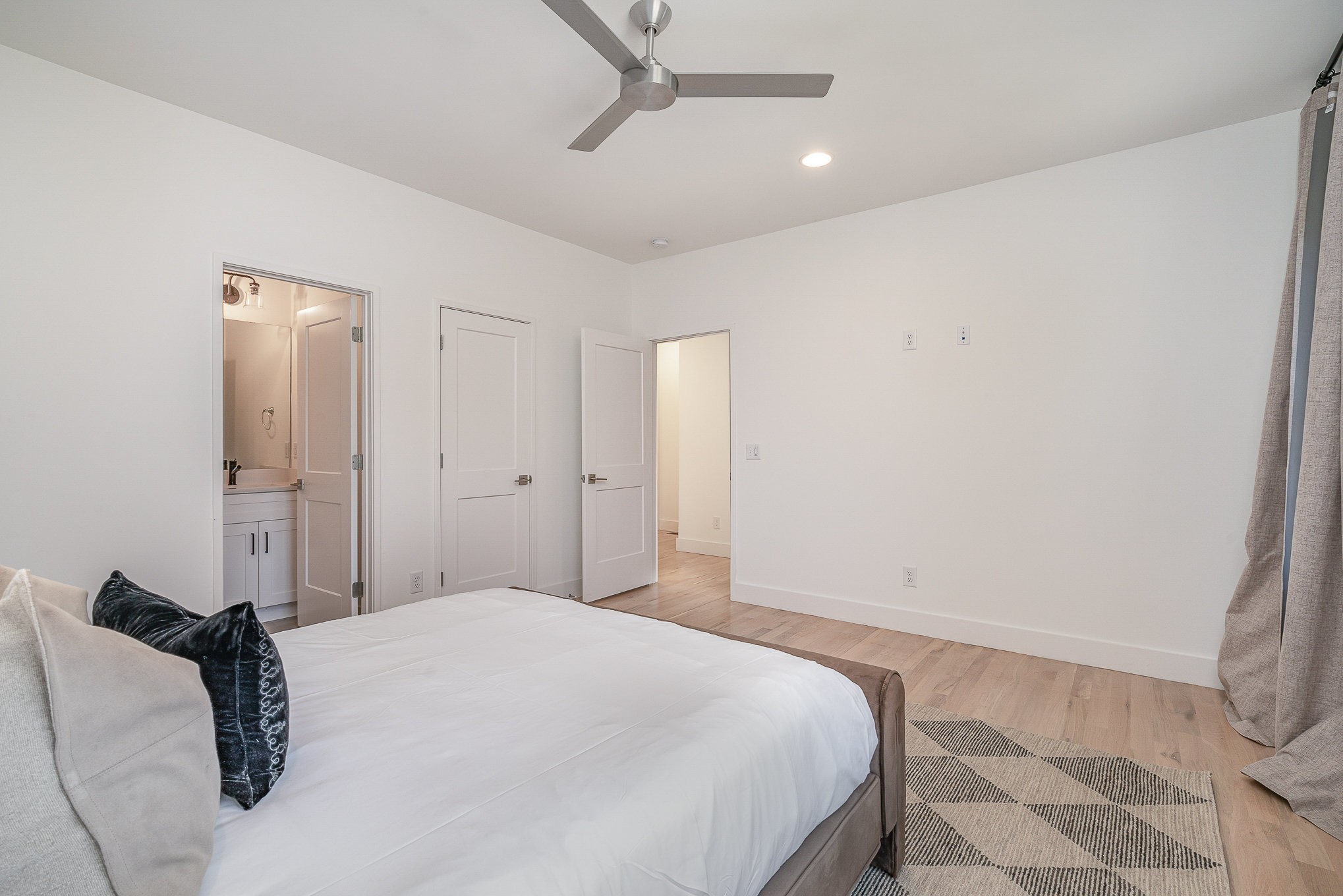 1699 Lischey Avenue Nashville, TN 37207 - Photo 27 of 45 a bedroom with a bed and a mirror