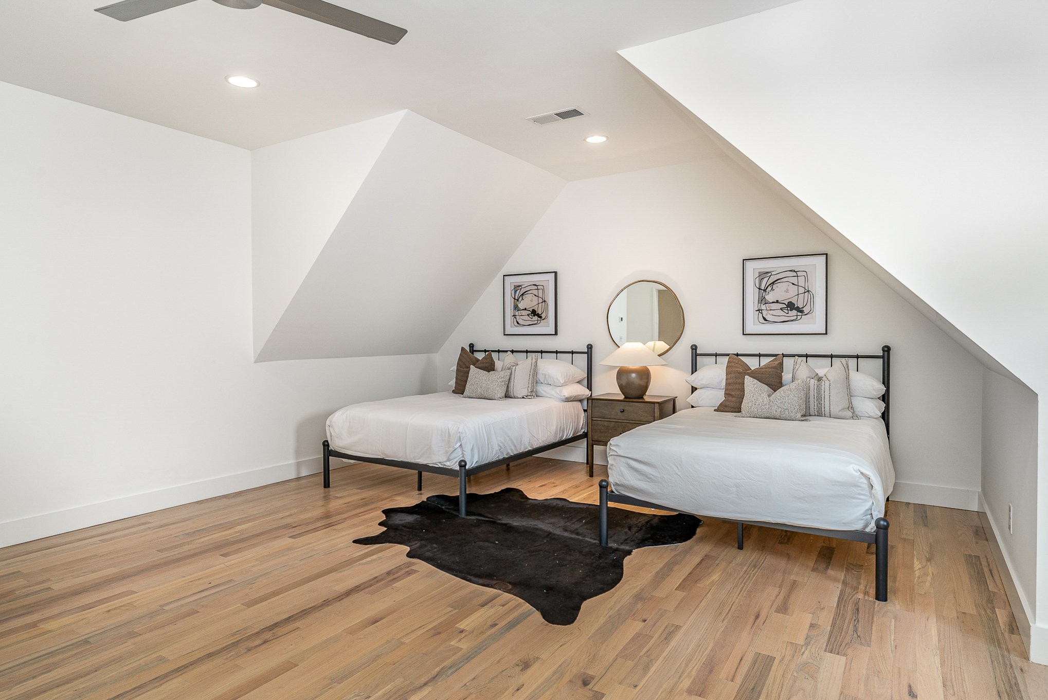 1699 Lischey Avenue Nashville, TN 37207 - Photo 42 of 45 a bedroom with a bed and wooden floor