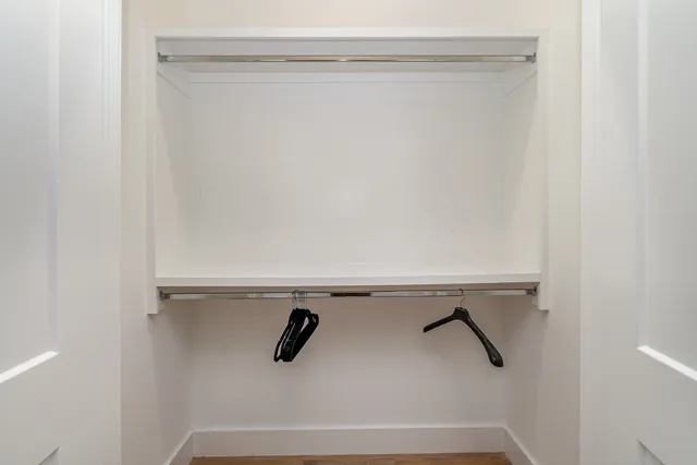 a front view of a house with garage