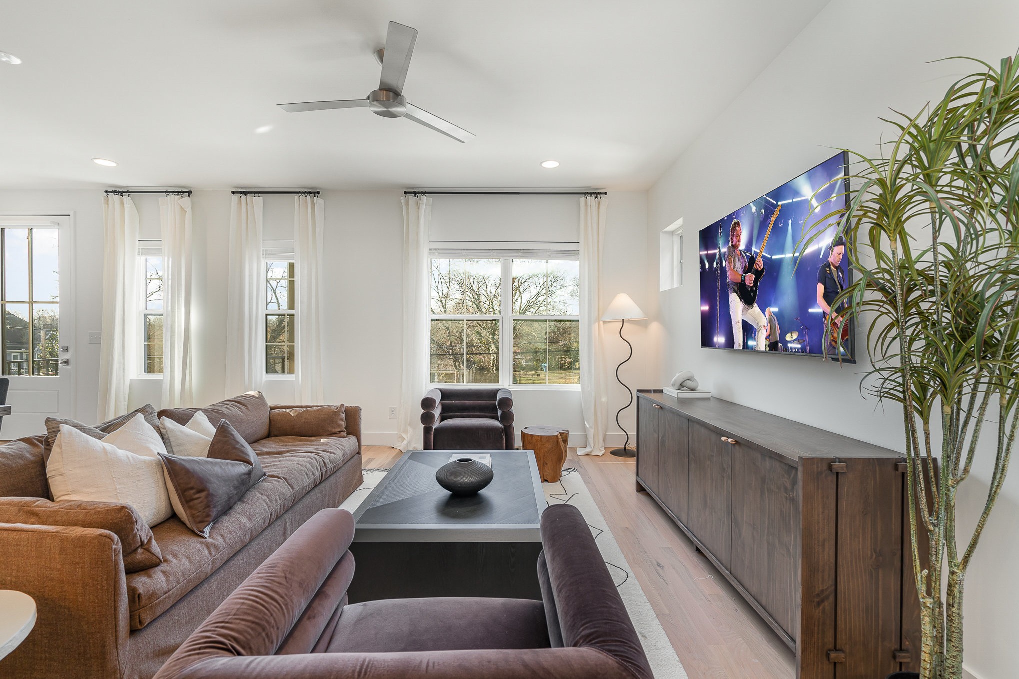 1699 Lischey Avenue Nashville, TN 37207 - Photo 10 of 45 a living room with furniture large window and wall paintings