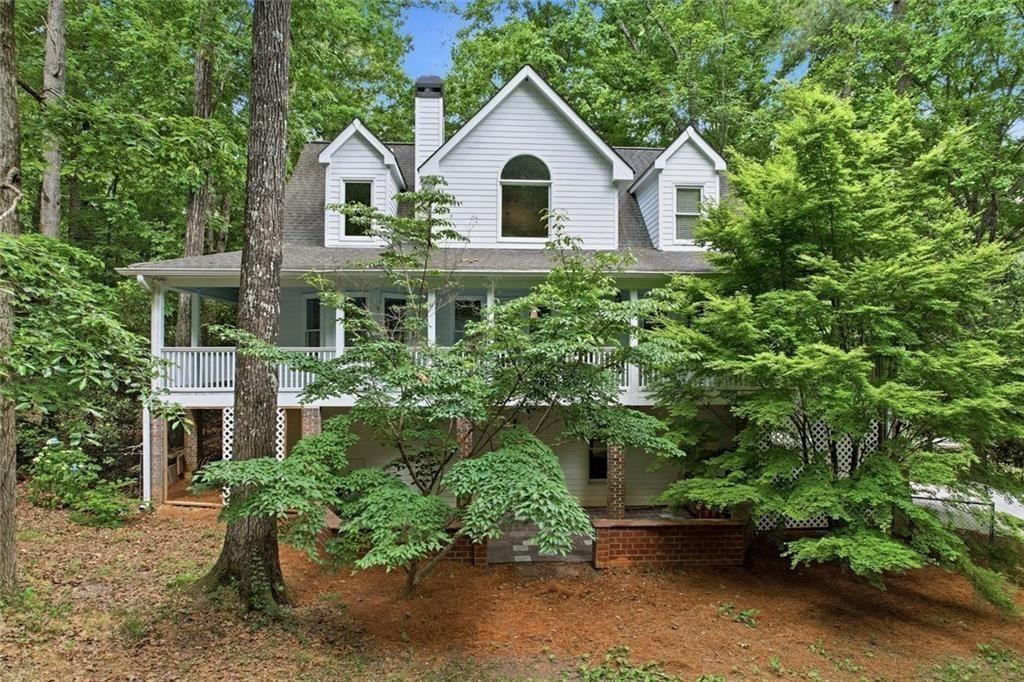 3259 Etchison Road Loganville, GA 30052 - Photo 40 of 50 a house view with a garden