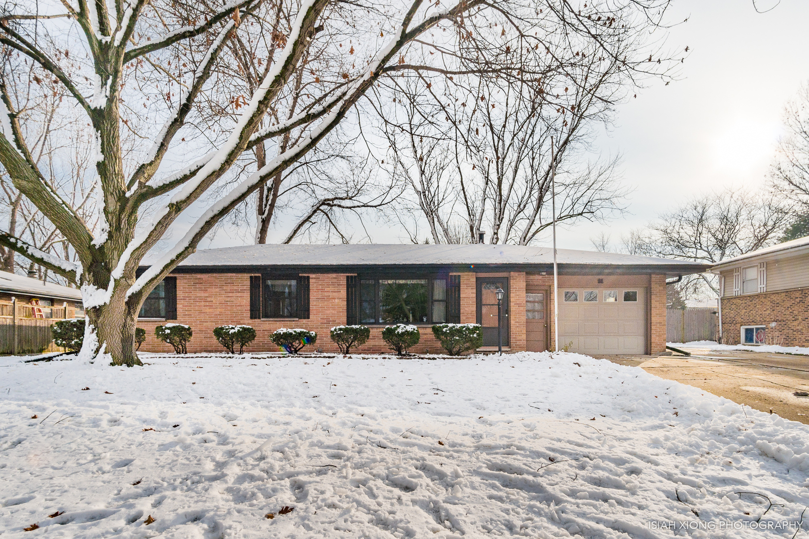 a front view of a building with a snow