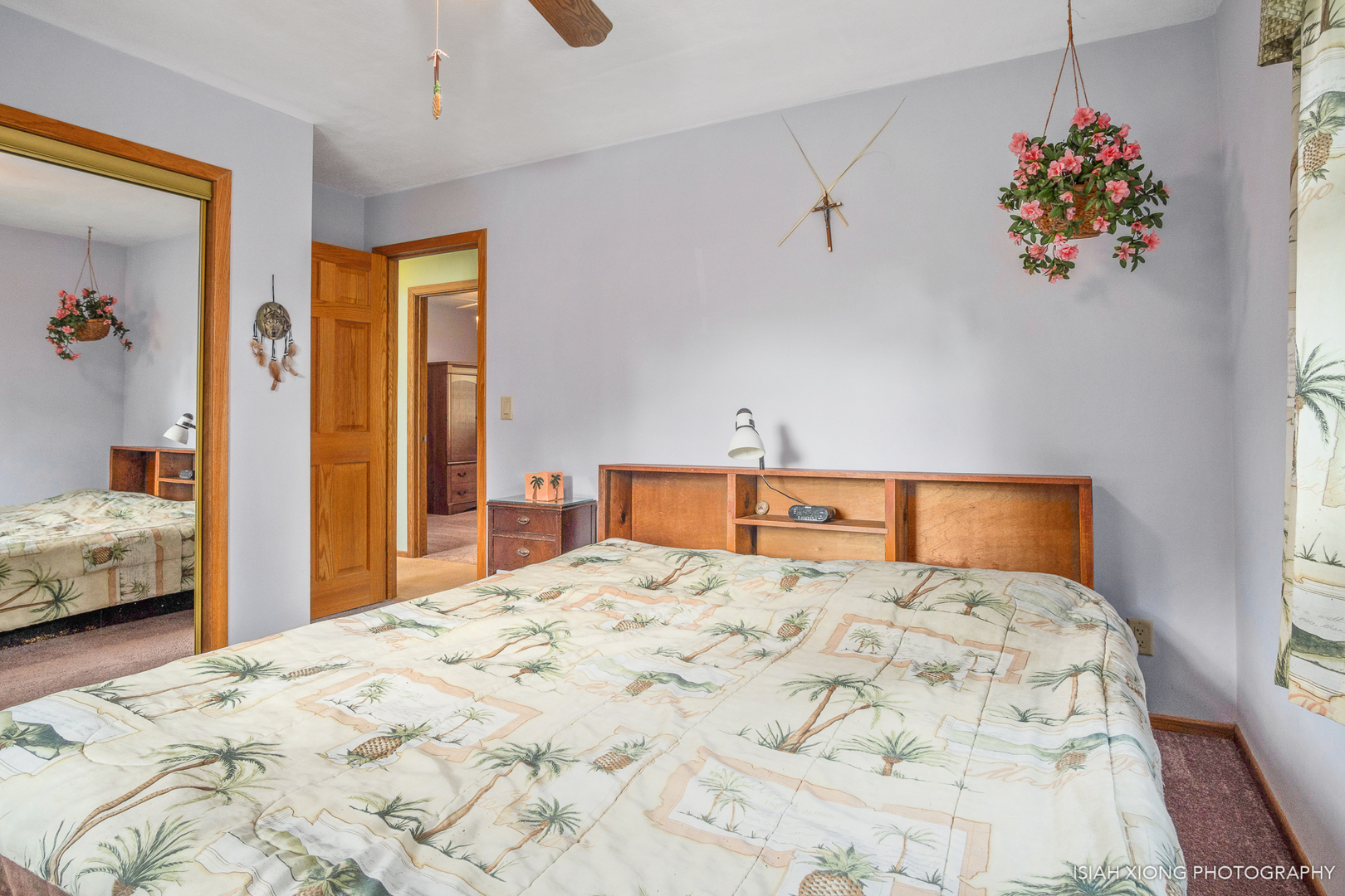 91 Neil Road Sugar Grove, IL 60554 - Photo 19 of 31 a bedroom with a bed and a chandelier