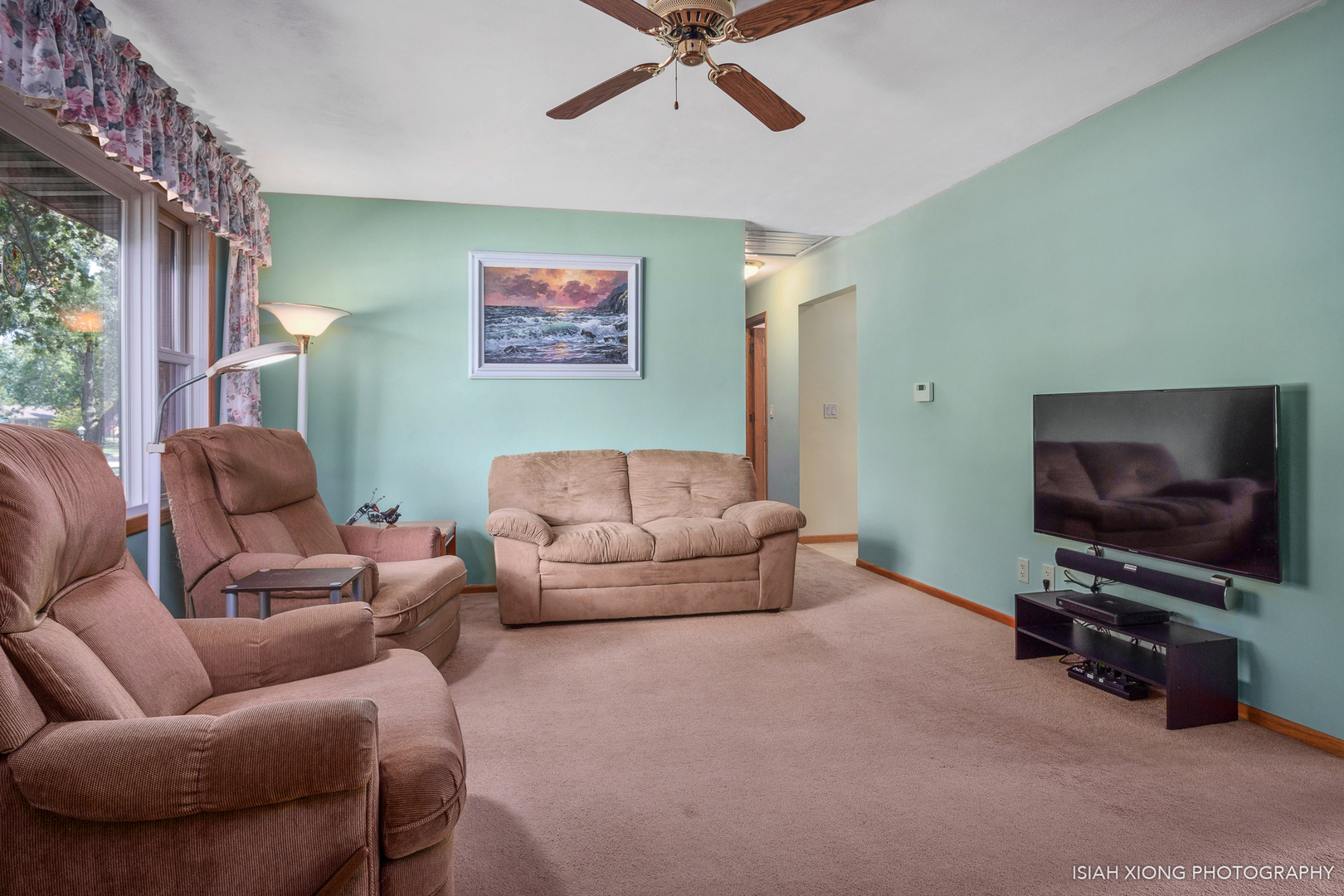 91 Neil Road Sugar Grove, IL 60554 - Photo 27 of 31 a living room with furniture and a flat screen tv