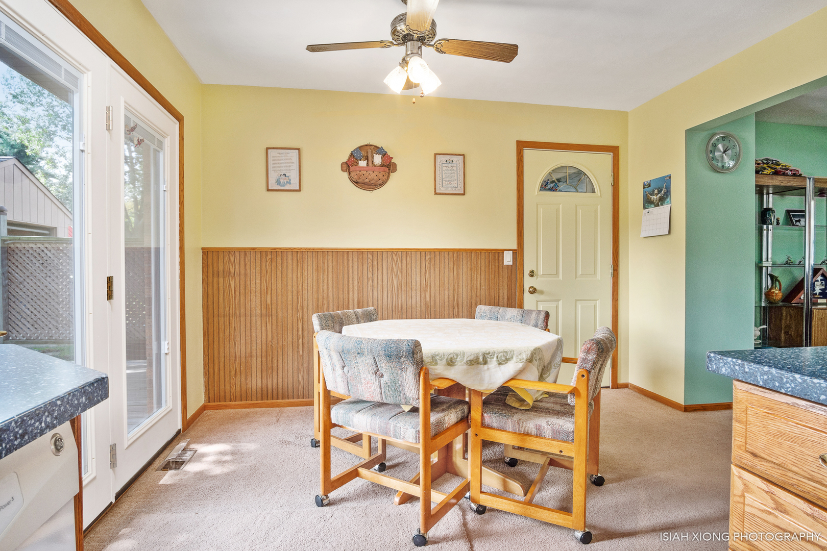 91 Neil Road Sugar Grove, IL 60554 - Photo 9 of 31 a view of a dining room with furniture and a chandelier fan