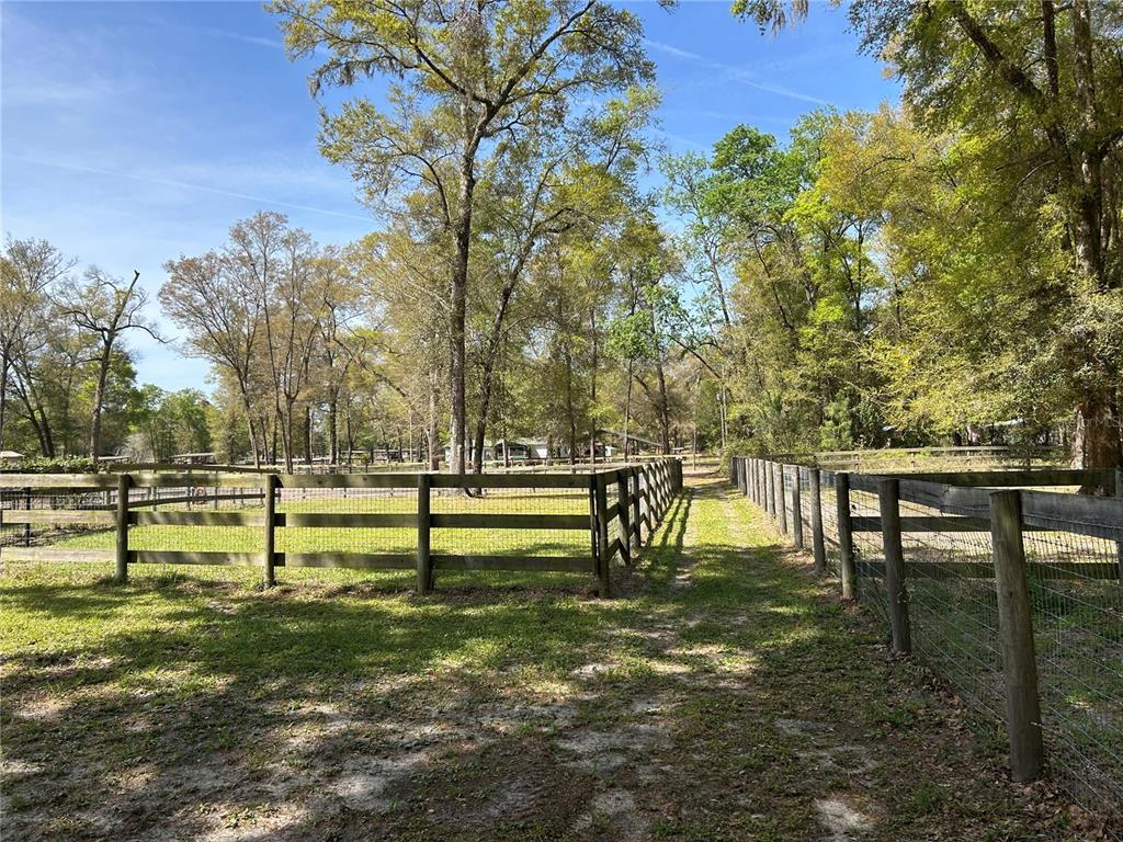 9290 Northwest 125th Avenue Ocala, FL 34482 - Photo 16 of 23 a view of swimming pool with a bench