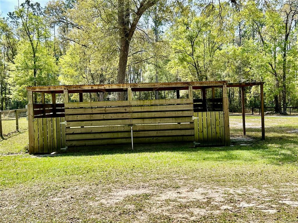 9290 Northwest 125th Avenue Ocala, FL 34482 - Photo 8 of 23 a view of outdoor space with deck and a lake view