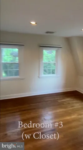 view of an empty room with a window
