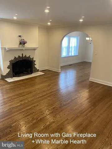 a view of a livingroom with a fireplace