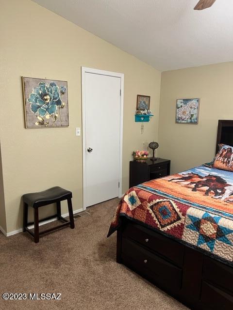 1343 Taylor Road Willcox, AZ 85643 - Photo 12 of 24 a bedroom with a bed and wall painting