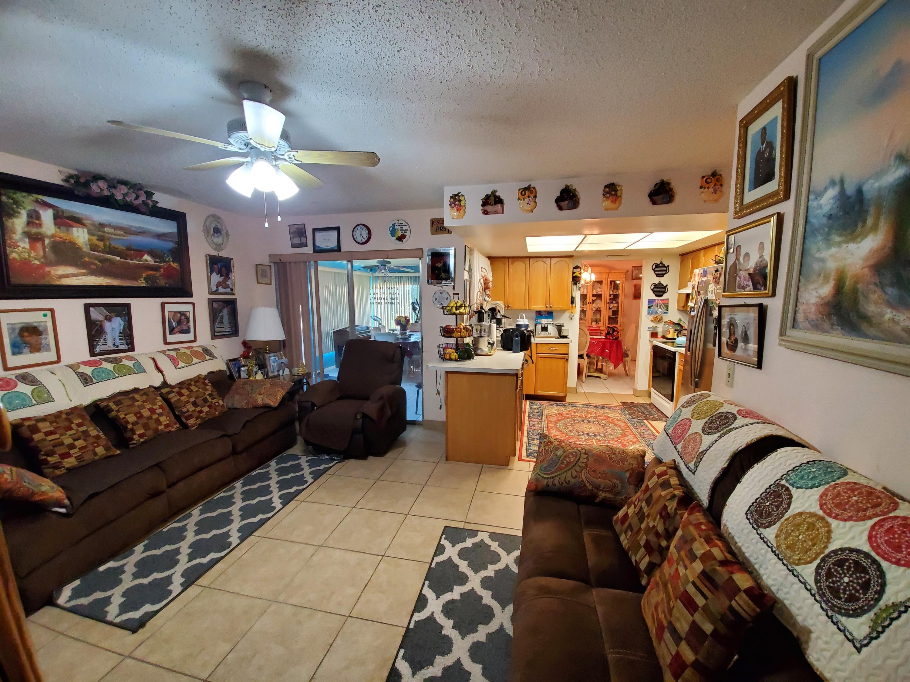 109 Timber Run East Riviera Beach, FL 33407 - Photo 2 of 15 Family Room off Kitchen