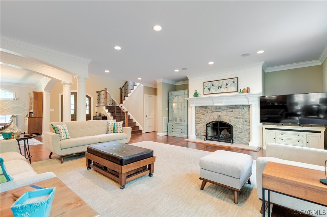 14641 West Salisbury Road Midlothian, VA 23113 - Photo 11 of 50 a living room with furniture flat screen tv and a fireplace