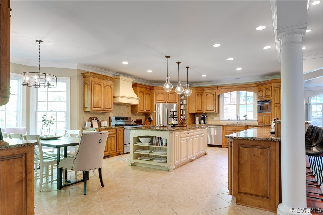 14641 West Salisbury Road Midlothian, VA 23113 - Photo 13 of 50 a kitchen with stainless steel appliances kitchen island granite countertop a sink and cabinets