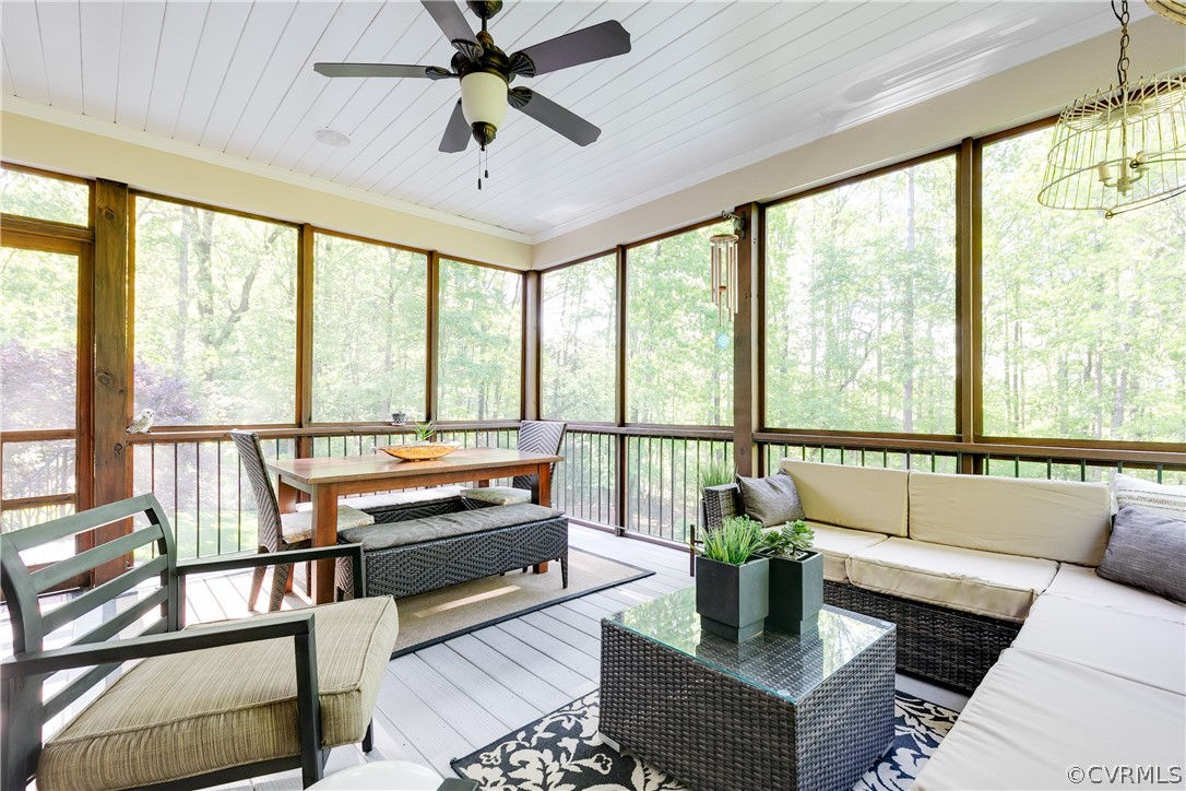 14641 West Salisbury Road Midlothian, VA 23113 - Photo 18 of 50 a living room with furniture and floor to ceiling windows
