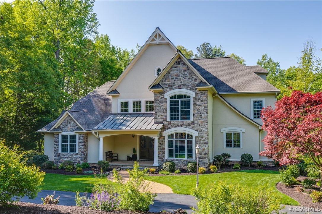 14641 West Salisbury Road Midlothian, VA 23113 - Photo 2 of 50 a front view of a house with a yard
