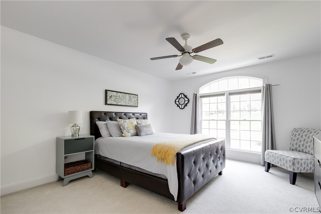 14641 West Salisbury Road Midlothian, VA 23113 - Photo 28 of 50 a bedroom with a bed and a large window