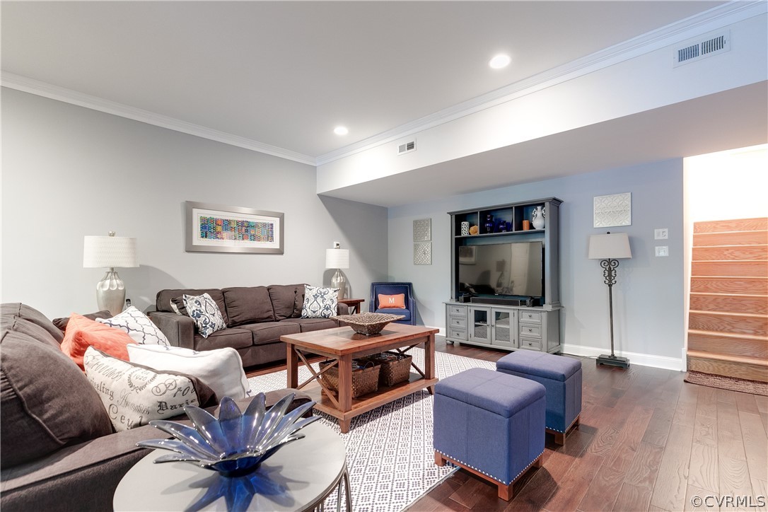 14641 West Salisbury Road Midlothian, VA 23113 - Photo 38 of 50 a living room with furniture and a flat screen tv