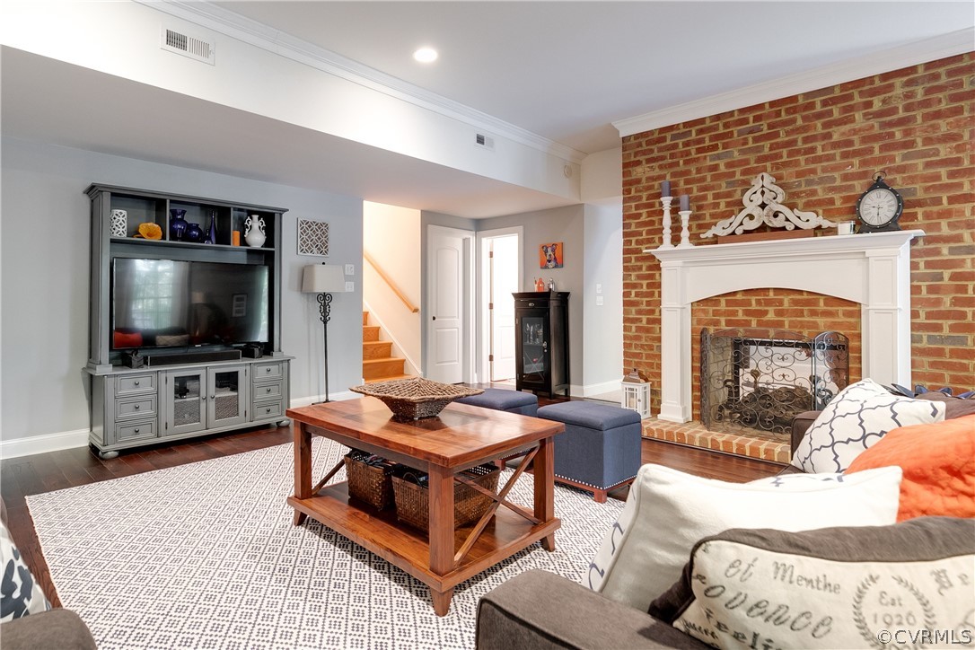 14641 West Salisbury Road Midlothian, VA 23113 - Photo 39 of 50 a living room with furniture and a flat screen tv