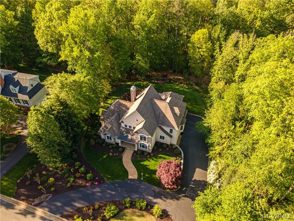 14641 West Salisbury Road Midlothian, VA 23113 - Photo 4 of 50 a sign that is sitting on a brick wall