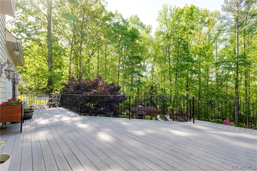 14641 West Salisbury Road Midlothian, VA 23113 - Photo 42 of 50 a house with trees in front of it