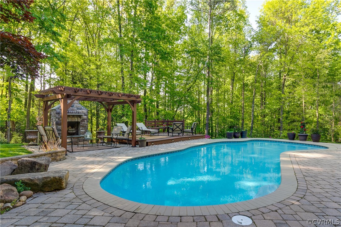 14641 West Salisbury Road Midlothian, VA 23113 - Photo 45 of 50 a view of a swimming pool with sitting area