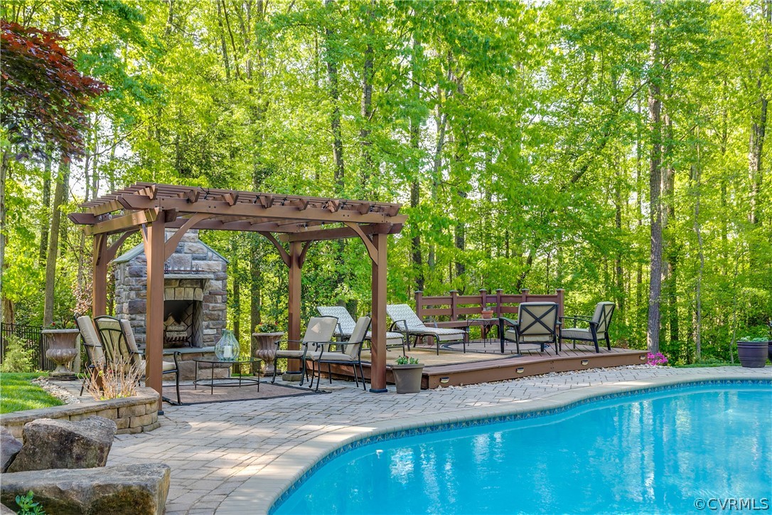 14641 West Salisbury Road Midlothian, VA 23113 - Photo 46 of 50 a view of outdoor space yard deck patio and swimming pool
