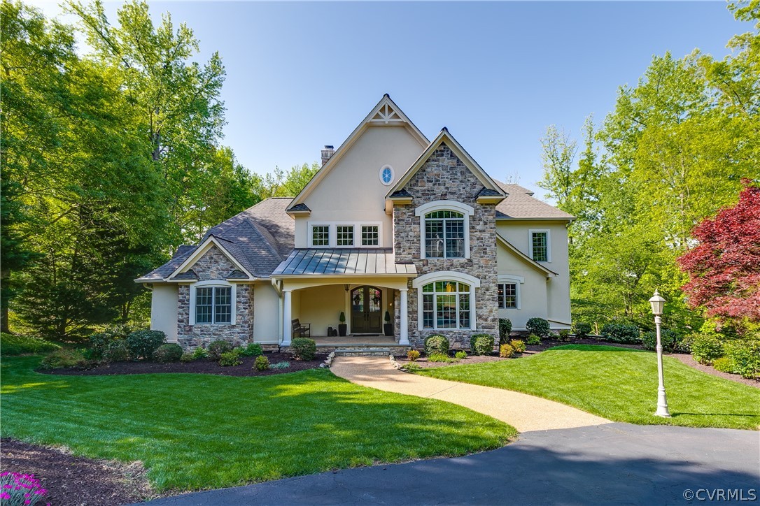 14641 West Salisbury Road Midlothian, VA 23113 - Photo 50 of 50 a front view of a house with yard and green space
