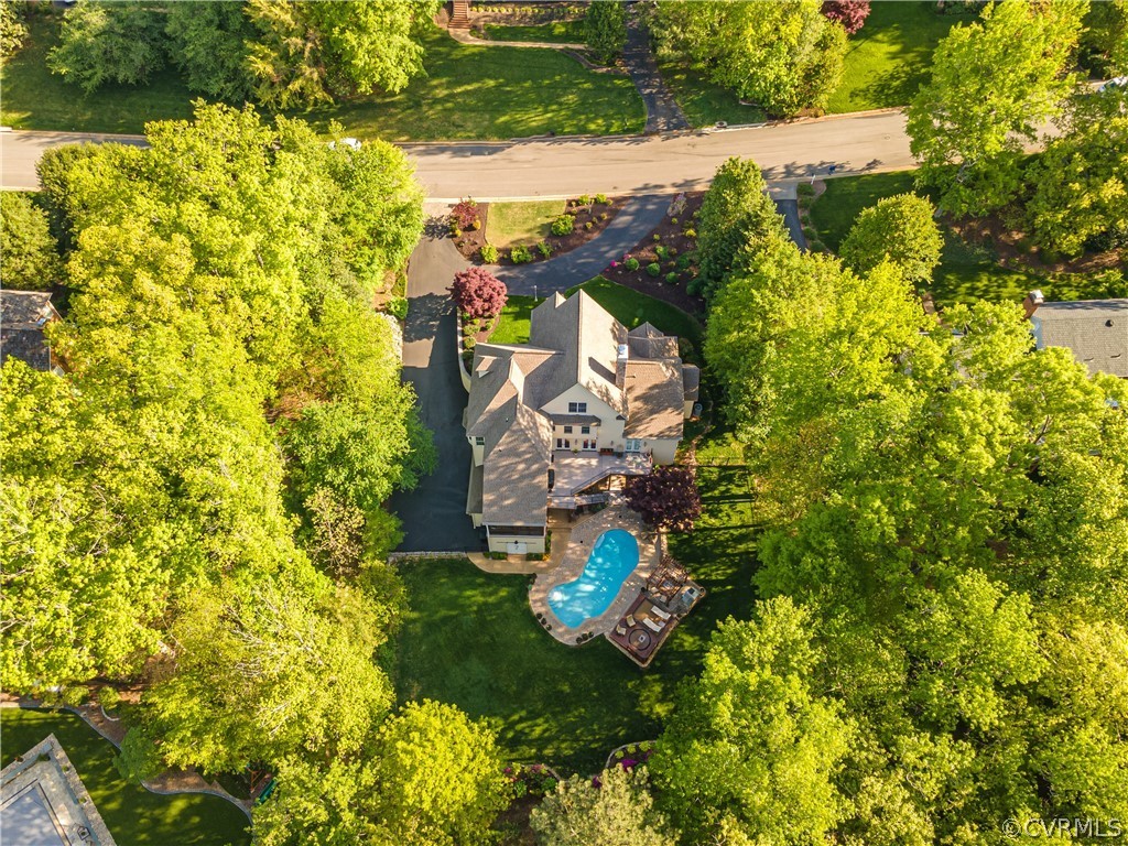14641 West Salisbury Road Midlothian, VA 23113 - Photo 5 of 50 a view of a yard with plants and large trees
