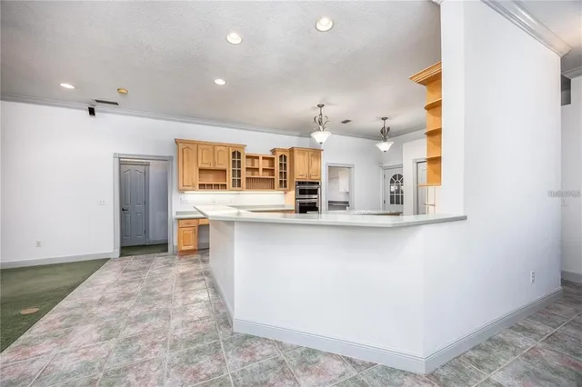 a view of livingroom with a ceiling fan and window