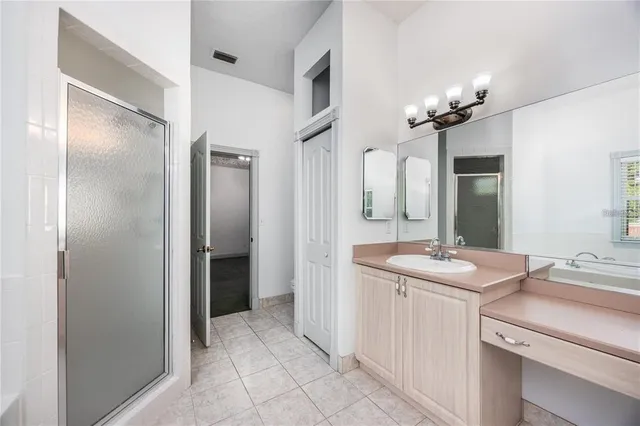 a view of a backyard with barn and large trees