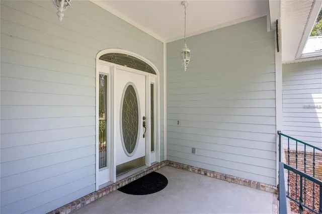 a large kitchen with kitchen island a sink stove and refrigerator