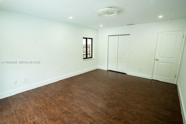 10210 Southwest 133rd Court Miami, FL 33186 - Photo 14 of 30 an empty room with windows