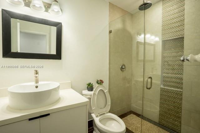 10210 Southwest 133rd Court Miami, FL 33186 - Photo 20 of 30 a bathroom with a sink toilet and shower
