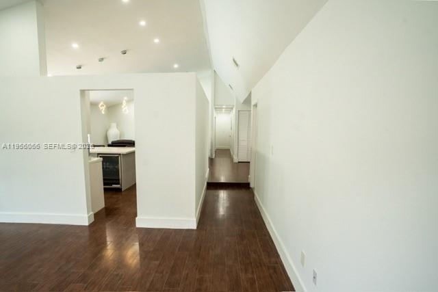 10210 Southwest 133rd Court Miami, FL 33186 - Photo 6 of 30 a view of a hallway with wooden floor and staircase