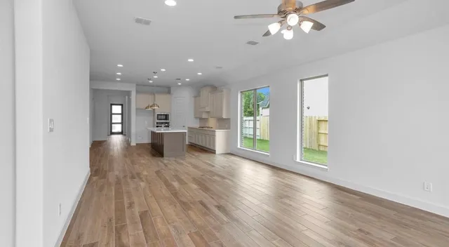 a view of a livingroom with a hardwood floor