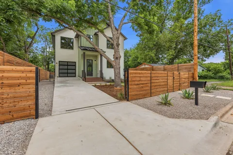 a backyard of a house with seating space
