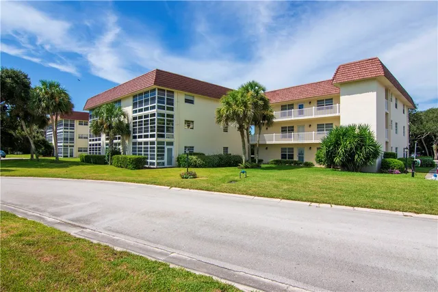 a view of a house with a swimming pool
