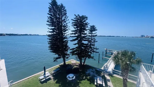 a view of a lake with a building in back