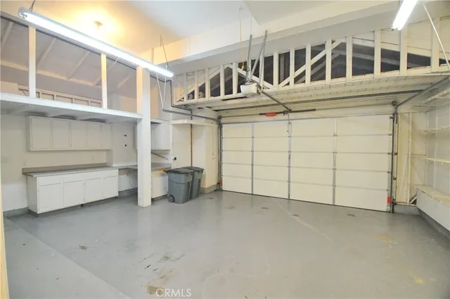 a view of outdoor space with garden and trees