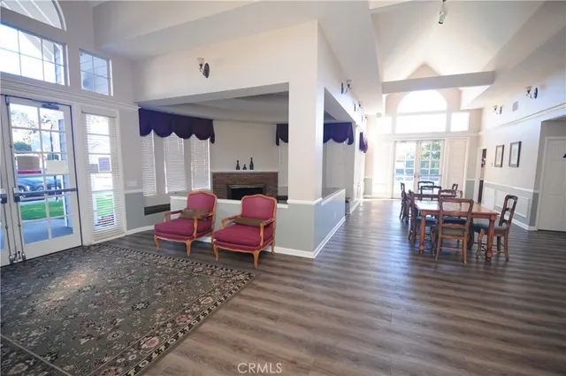 a view of house with outdoor space and sitting area