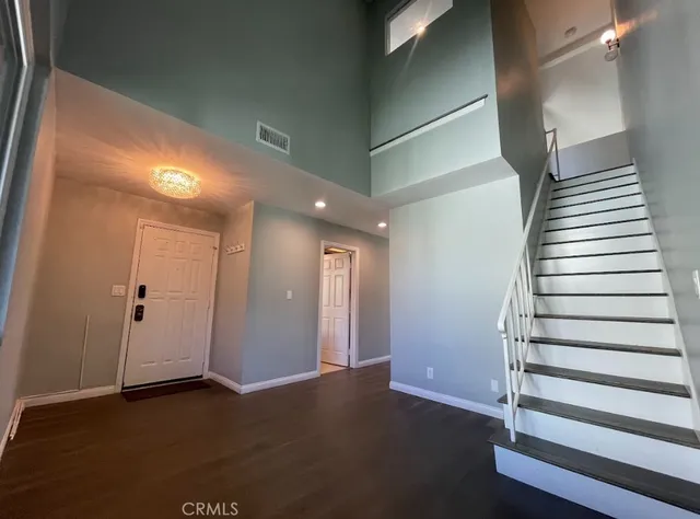 a view of entryway with stairs