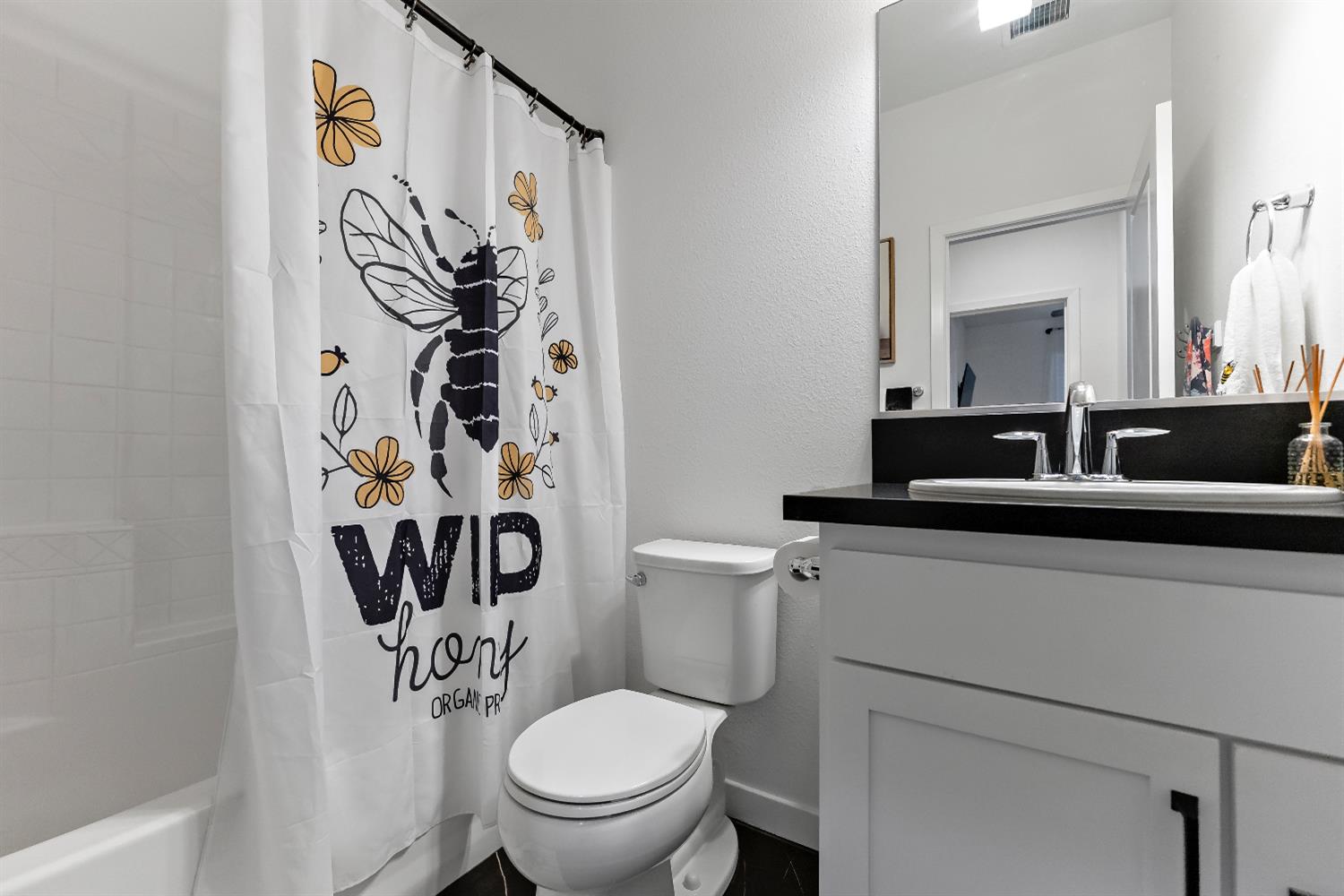 4301 San Miguel Road Madera, CA 93636 - Photo 11 of 20 a bathroom with a toilet sink and mirror