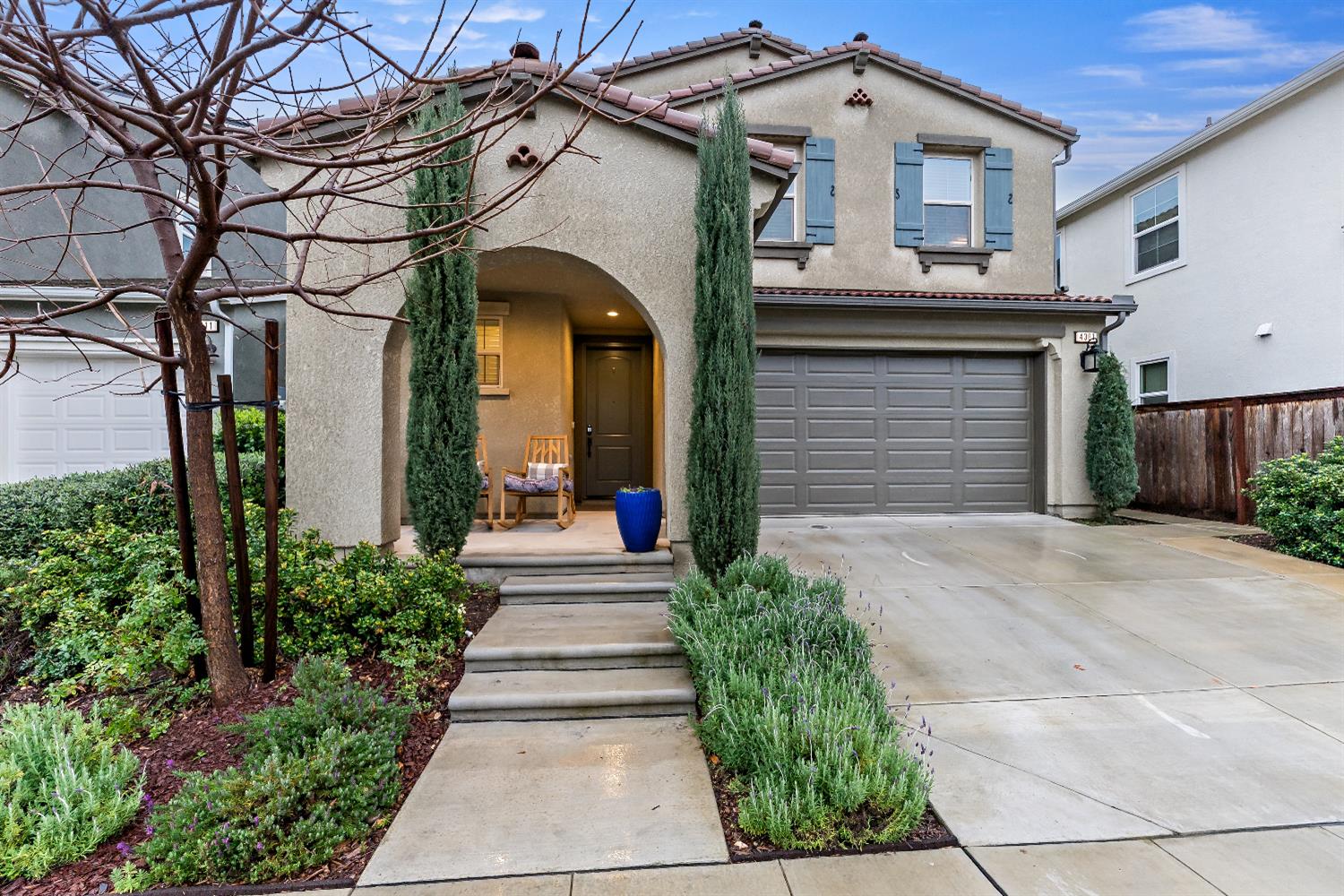 4301 San Miguel Road Madera, CA 93636 - Photo 13 of 20 a front view of a house with a garden