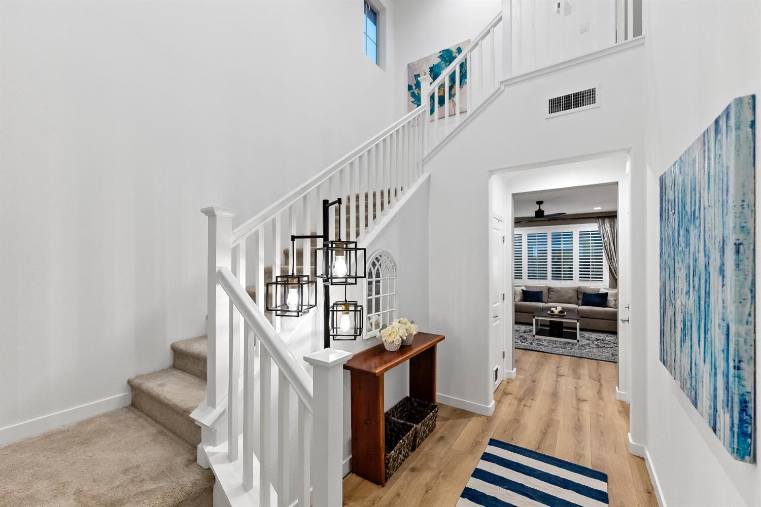 4301 San Miguel Road Madera, CA 93636 - Photo 14 of 20 a view of entryway with wooden floor and stairs